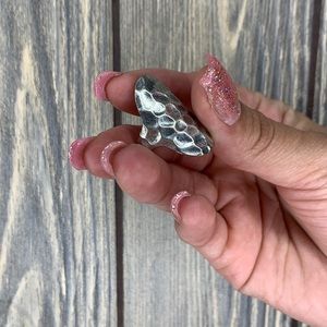 Silver indented designed ring